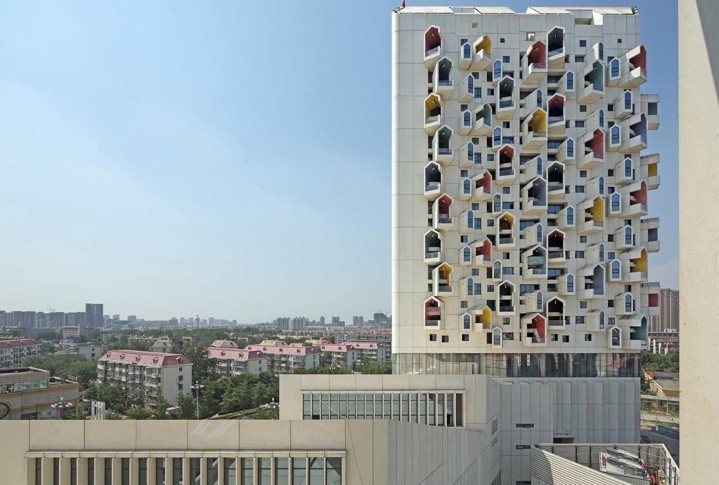 Трехмерные дома: в Китае возвели многоэтажки со странными террасами – фото