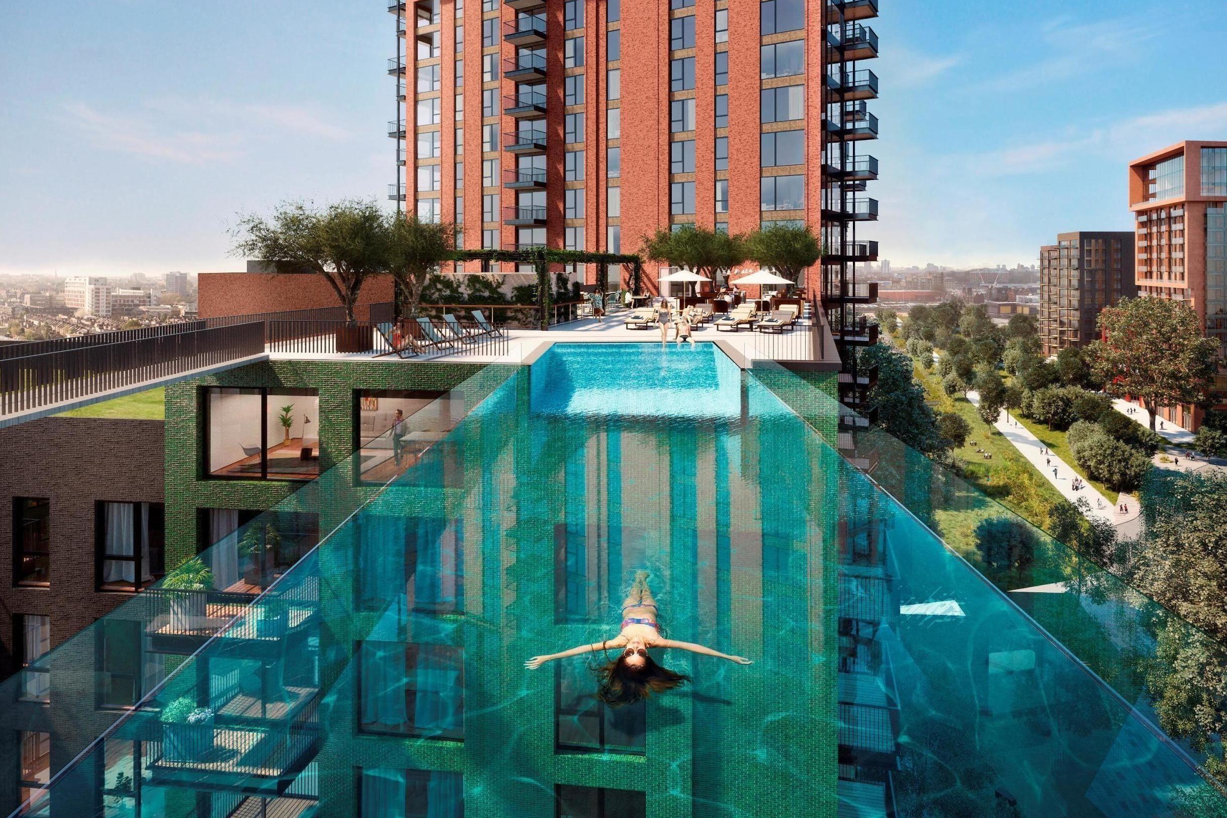 Завершается строительство жилого комплекса с прозрачным бассейном на высоте 35 метров: видео